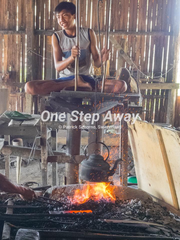 Myanmar - Inle Lake / Steel factory sitting man and fire, Stahl Fabrik sitzender Mann und Feuer