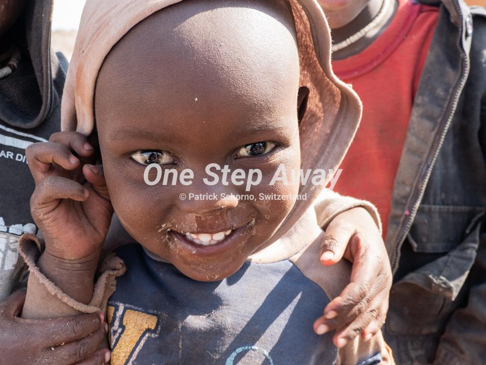 Namibia - Camp Aussicht / Visit Himba village little boy, Besuch Himba Dorf kleiner Junge