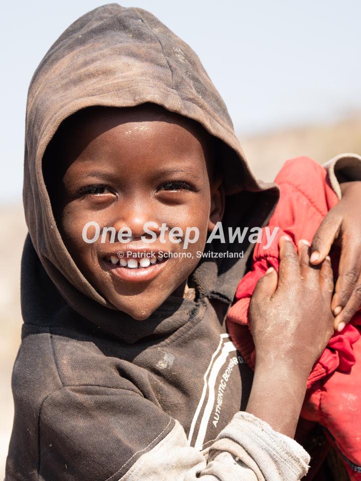 Namibia - Camp Aussicht / Visit Himba village little boy, Besuch Himba Dorf kleiner Knabe